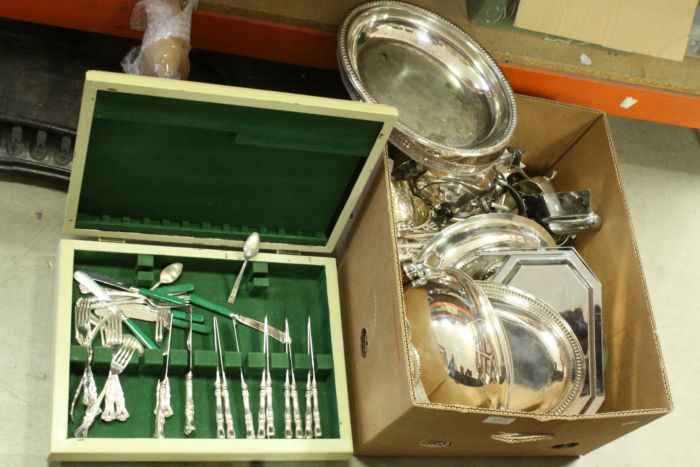 A quantity of silver plate to include teaset ,serving dishes ,boxed cutlery and animal figures