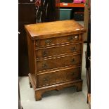 A Bevan Funnell, reproduction burr walnut 20th century batchelors chest