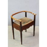Early 20th century Piano Stool with Back Rail with hinged seat opening to sheet music compartment,