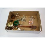 A box of mixed collectables to include a small silver plated goblet and a selection of napkin