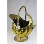Victorian Brass Coal Scuttle of Nautilus Shell form, 54cms to top of handle