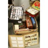 A large quantity of vintage and early 20th century cigarette card and albums.