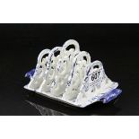 19th century blue and white creamware toast rack with pierced decoration.