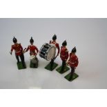 Five Britains lead toy marching band members soldiers.