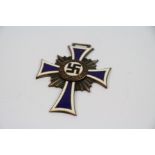 A Full Size World War Two German Mothers Cross Medal In Bronze With Enamel Detailing, Marked 16th