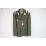 A East German DDR Military Uniform To Include Jacket And Trousers.