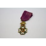 A Belgium Order Of Leopold Miniature Medal With Original Ribbon.