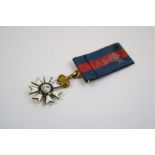 A British Distinguished Order Of St. Michael And St. George Miniature Medal With Original Ribbon.