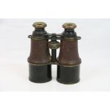 A Pair Of World War One Era British Military Issued Field Binoculars With Broad Arrow Markings.