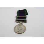 A British Full Size General Service Medal With Two Bars To Include Borneo And Radfan Named And