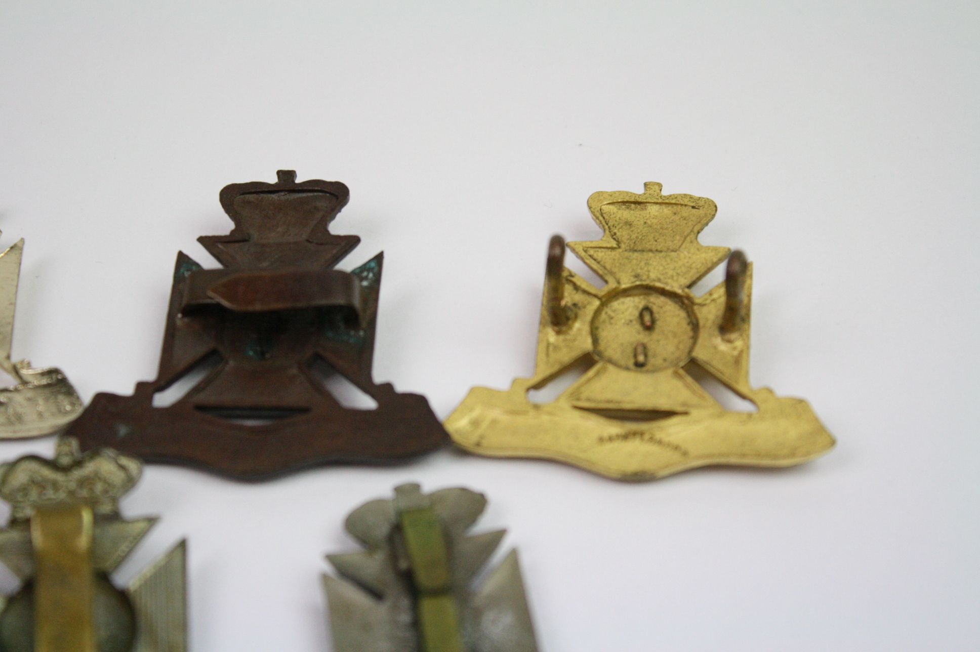 A Collection Of Seven The Wiltshire Regiment Cap Badges To Include A Bronzed, Brass, White Metal, - Image 12 of 14