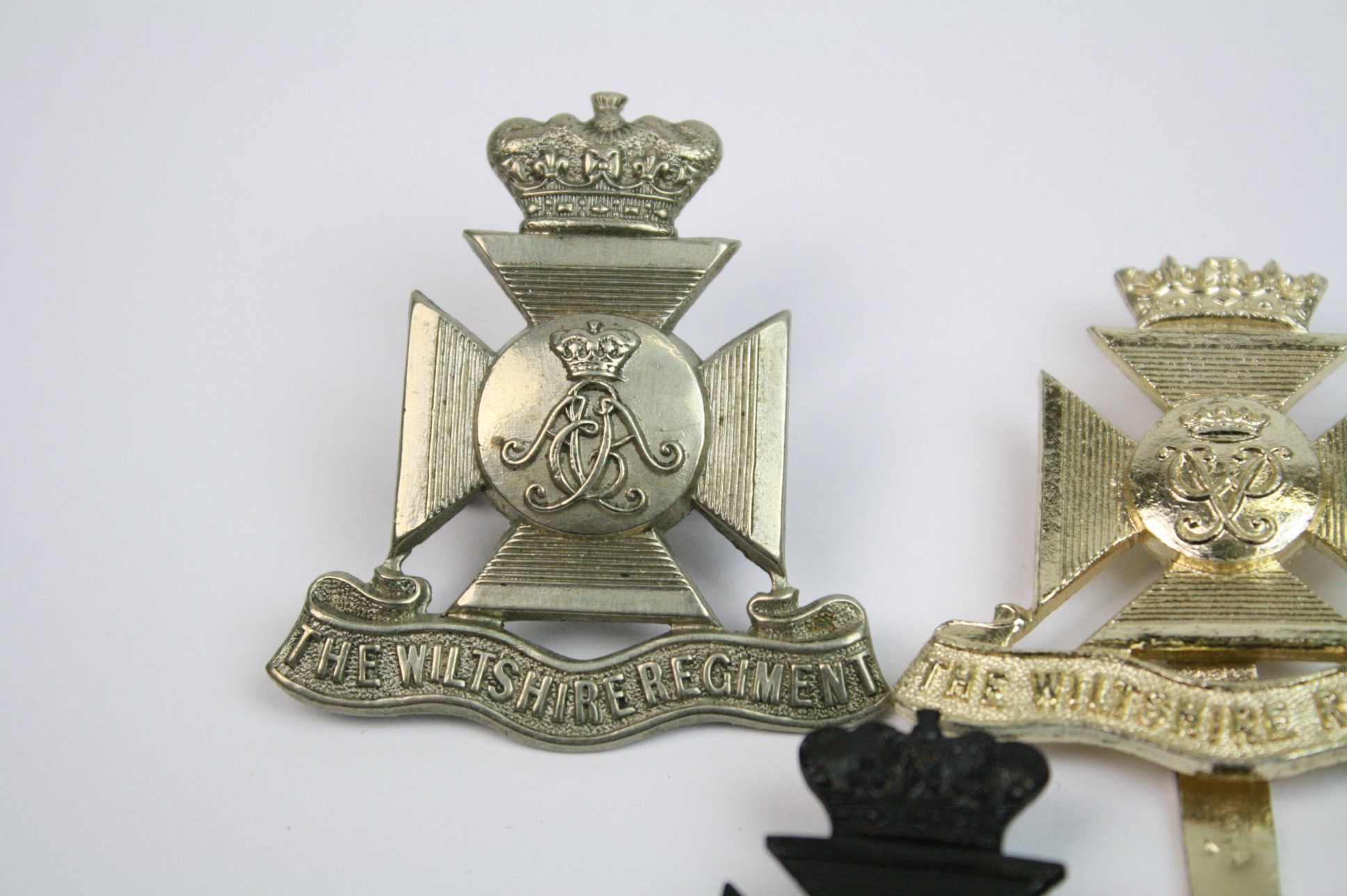 A Collection Of Seven The Wiltshire Regiment Cap Badges To Include A Bronzed, Brass, White Metal, - Image 3 of 14