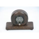 A Vintage World War Two Era American Elgin Pioneer Aircraft Clock Mounted In A Wooden Case.