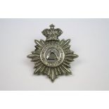A White Metal Cap Badge To The 4th Volunteer Battalion Of The Hampshire Regiment With Queen