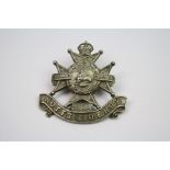 A White Metal Cap Badge To The 1st Volunteer Battalion Of The Notts And Derby Regiment With Kings