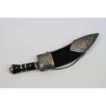 A Gurkha Kukri Knife With Silver Mounted Scabbard.