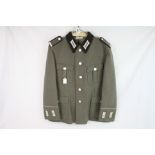 A East German DDR Military Uniform To Include Tunic And Trousers.