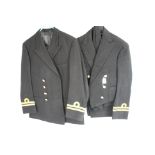 Two Vintage British Royal Navy Uniforms Complete With Associated Buttons And Badges.