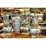 Three Matching Early 20th century Chintz Pattern Ceramic Table Lamps h.34cms plus another similar,