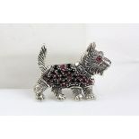 A silver westie brooch set with multi-coloured CZ's