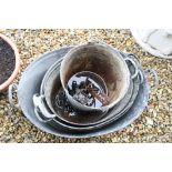 Four Galvanised Wash Tubs (largest 73cms) together with a Bucket and Three Gin Traps