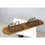 Vintage metal two section horse tack rack mounted on pine base