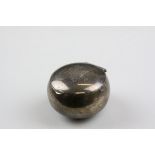 A Victorian Hallmarked silver pill box dating to 1876 with a Birmingham Assay mark.