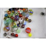 A small collection of vintage marbles.