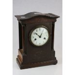 Late 19th / Early 20th century Wooden Cased Mantle Clock, the white enamel dial with arabic