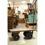 Early 20th century Gold Bullion Trolley with a Hardwood Top and Cast Iron Base, each wheel stamped '