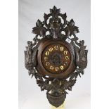 An early 20th century large black forest two train wall clock for repair.