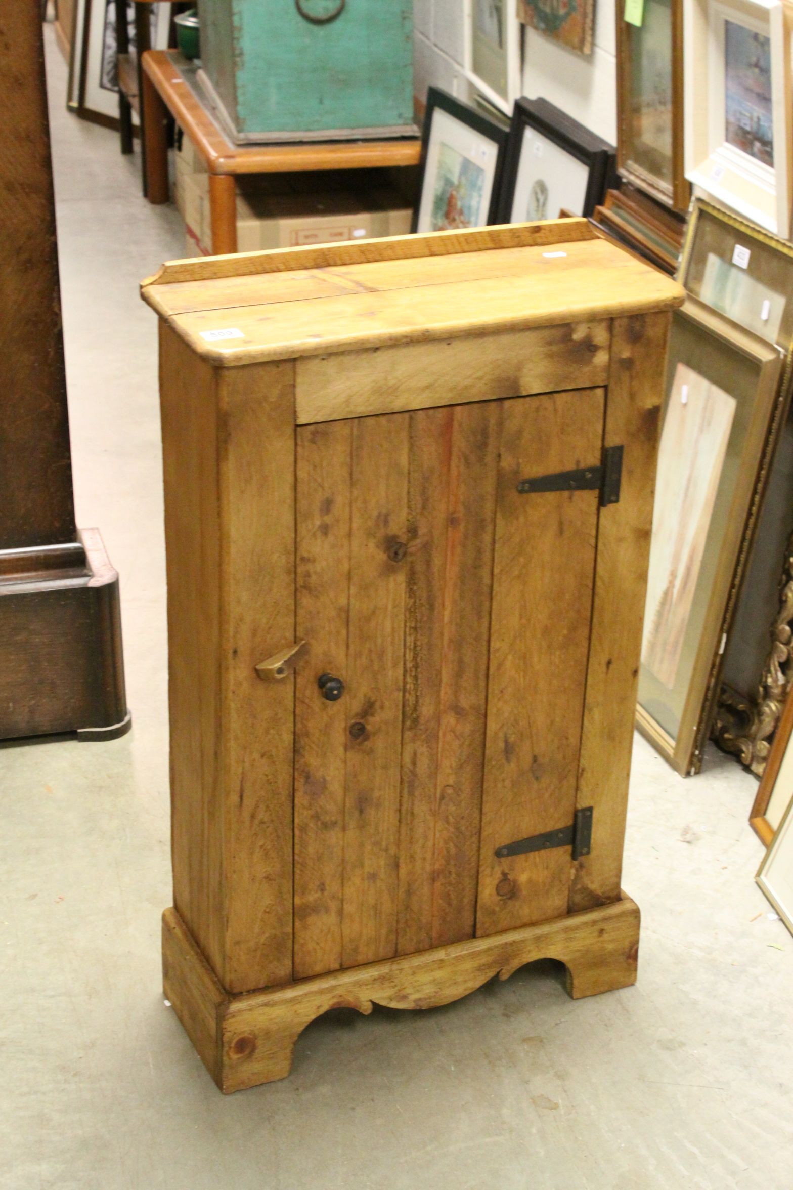 Pine kitchen storage cupboard, with shelves on shaped base