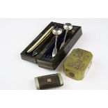 Two cut throat razors in wooden box with brass banding together with a wooden snuff box and brass