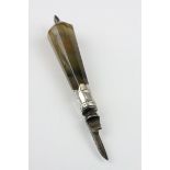 A 19th century quill knife with agate handle and white metal embellishments.