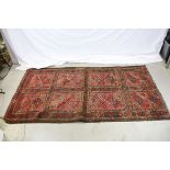 Eastern Red Ground Wool Rug with Geometric Pattern, 190cms x 103cms