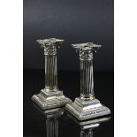 Pair of Silver Plated Corinthian Column Candlesticks, h.17cms