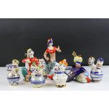 A collection of seven Ali Baba porcelain figurines by Korosten porcelain works USSR with gold gilt.