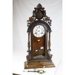 19th century Walnut Cased Regulator Mantle Clock, Carved Dog Mask to Pediment, the white enamel face