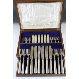 A cased set of twelve fully hallmarked sterling silver fish knives and forks, complete in original