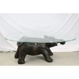 Mid 20th century Coffee Table with Oval Glass Top and the base formed from a model of an Elephant,