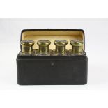 Early 20th century Cased Set of Four Glass Cologne Bottles with Gilt Metal Screw-on Lids, L.18cms