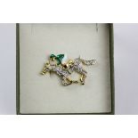 Gilt and diamante enamel horse & jockey brooch