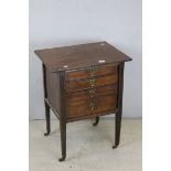Edwardian Mahogany String Inlaid Music Cabinet of Four Drawers, raised on square tapering legs on