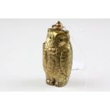 A brass sovereign case in the form of an Owl