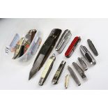 Collection of vintage pen knifes to include a swiss army example.