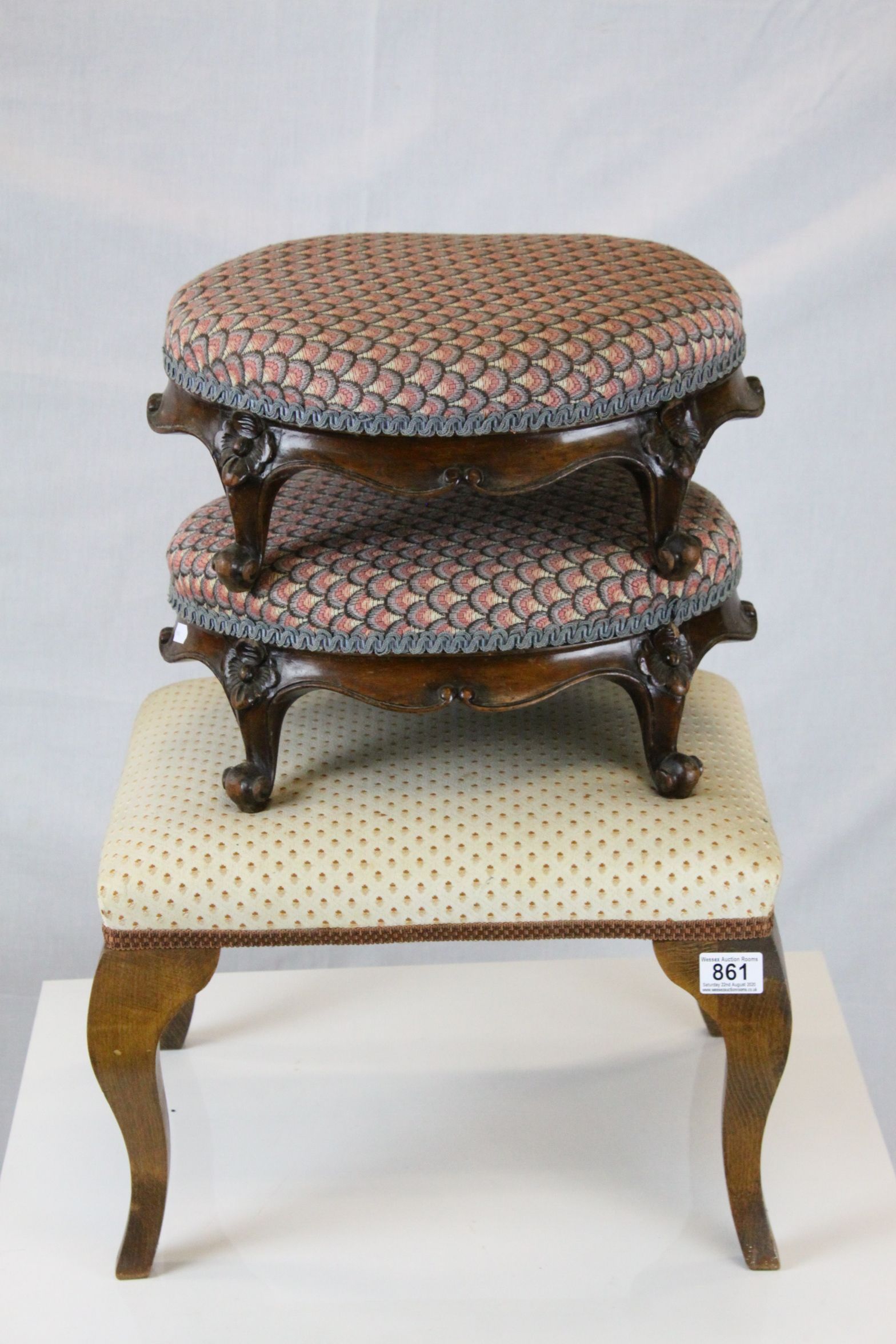 Pair of Victorian Oval Upholstered Footstools, w.45cms h.15cms together with another Upholstered