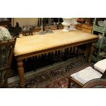 Large Continental Pine Kitchen / Dining Table with carvings to apron and raised on turned legs, L.
