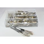 A large quantity of mixed silverplated flatware and cutlery.