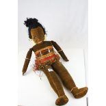 Norah Wellings brown velvet covered "Island girl" in grass skirted dress with bead bracelet and hoop