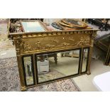 Regency Giltwood Overmantle Mirror with Three Bevelled Panes, beneath a classical frieze showing a